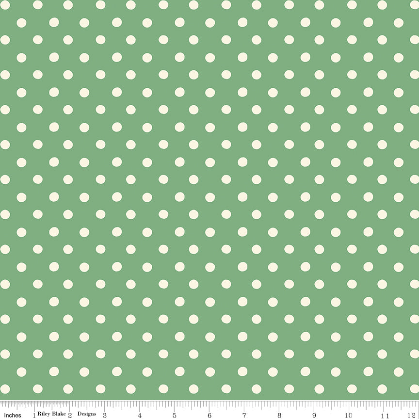 Cath Kidston Signature Button Spot Green fabric print with ruler showing scale