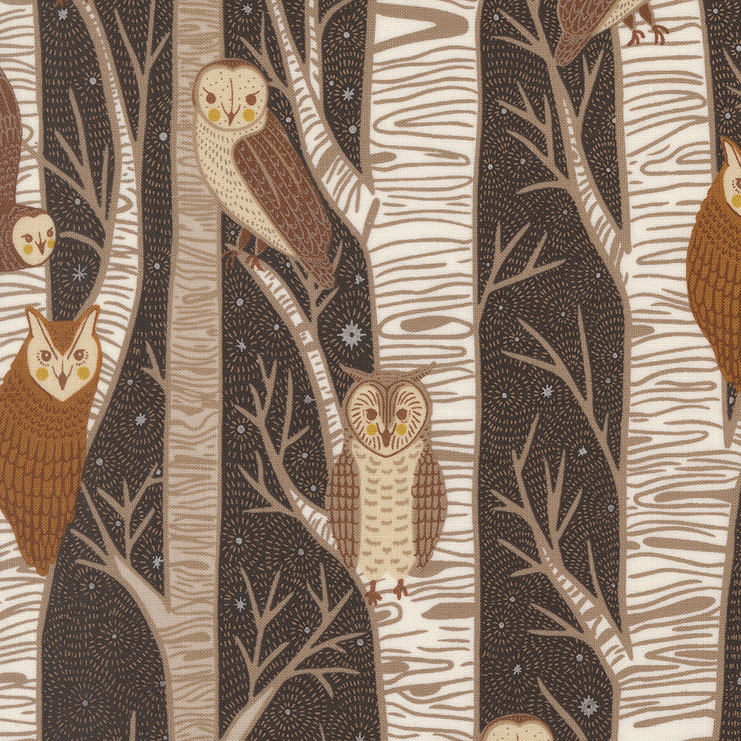 Pattern of owls and trees on a fabric background