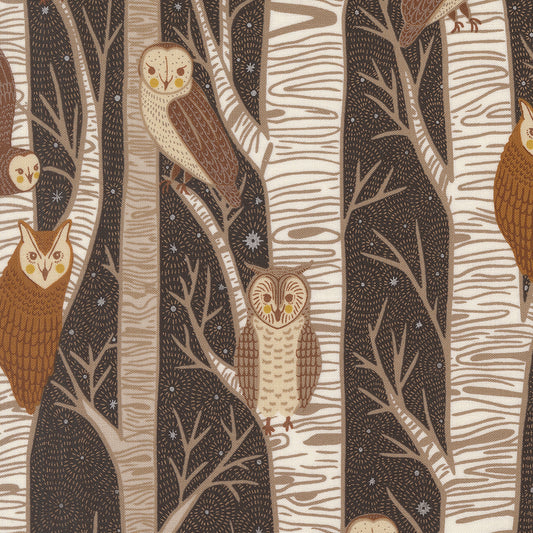 Pattern of owls and trees on a fabric background