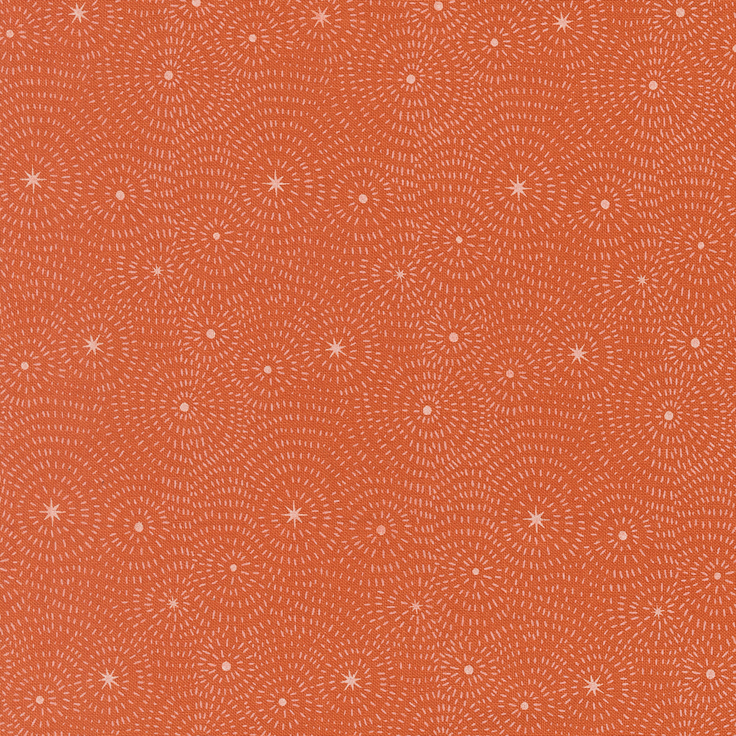 Pattern of concentric circles and stars on a clay background from Night Owl by Gingiber for Moda Fabrics.
