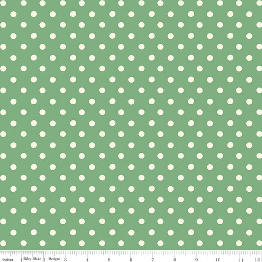 Cath Kidston Signature Button Spot Green fabric print with ruler showing scale