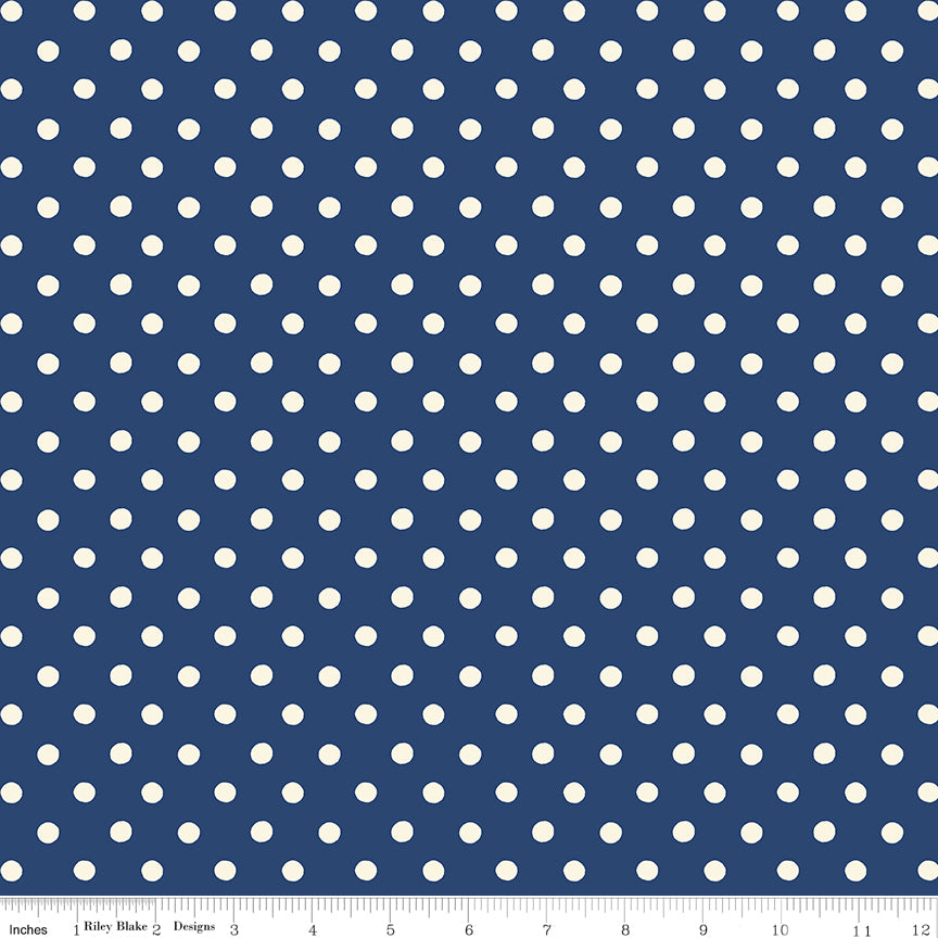 Cath Kidston Signature Button Spot Navy fabric print with ruler showing scale