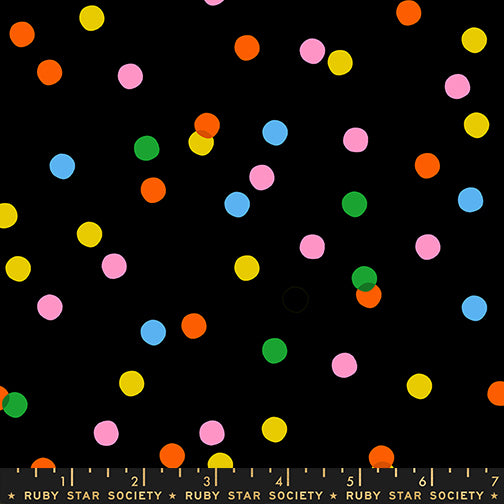 Sparkle Mart Spritz Black fabric print with ruler showing scale